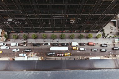 NEW YORK, USA - OCTOBER 8, 2018: view from above over vehicles on new york street, usa  clipart