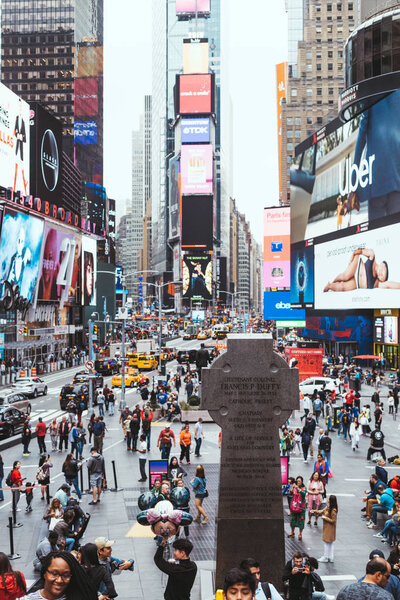TIMES SQUARE, NEW YORK, USA - OCTOBER 8, 2018: urban scene with crowded times square in new york, usa