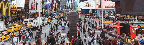 TIMES SQUARE, NEW YORK, USA - OCTOBER 8, 2018: panoramic view of crowded times square in new york, usa