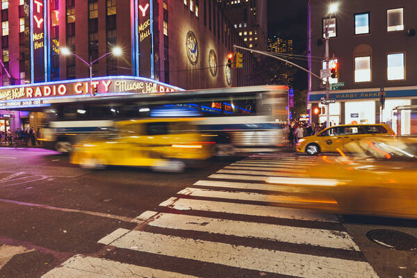 TIMES SQUARE, NEW YORK, USA - OCTOBER 8, 2018: motion picture of times square and cars in new york at night, usa