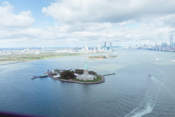 STATUE OF LIBERTY, NEW YORK, USA - OCTOBER 8, 2018: aerial view of statue of freedom in New york, usa
