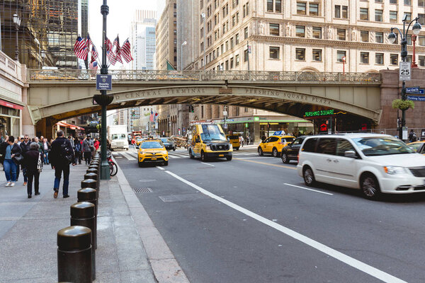 NEW YORK, USA - OCTOBER 8, 2018: urban scene with vehicles on city street of new york, usa
