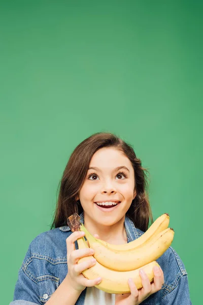 Excited Adorable Child Holding Bananas Isolated Green — Stock Photo, Image