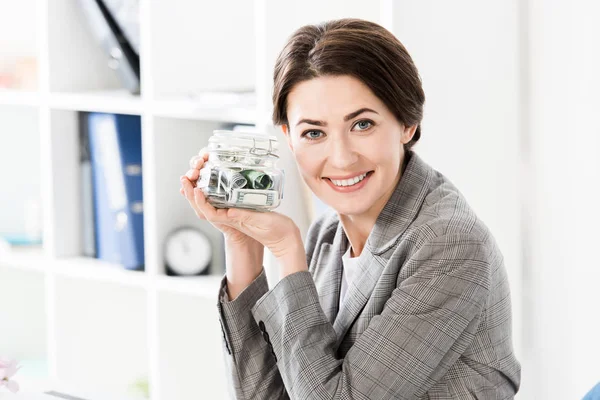 Attractive Happy Businesswoman Holding Glass Jar Money Office Looking Camera — Stock Photo, Image