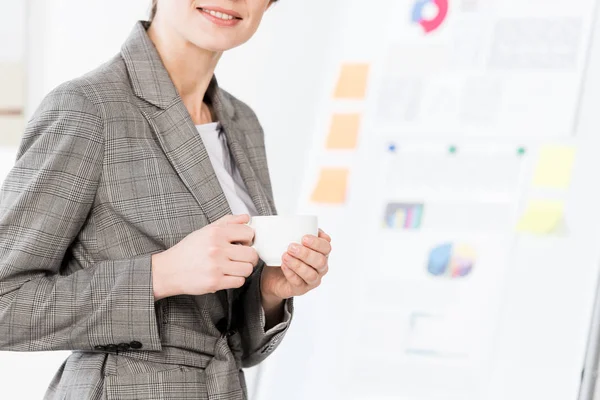 Cropped Image Businesswoman Grey Suit Holding Cup Coffee Office — Stock Photo, Image