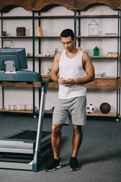 Full Length Strong Racial Man Using Smartphone Treadmill — Stock Photo, Image