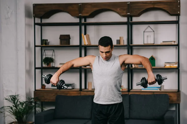 Muscular Racial Man Exercising Dumbbells Sportswear Living Room — Stock Photo, Image