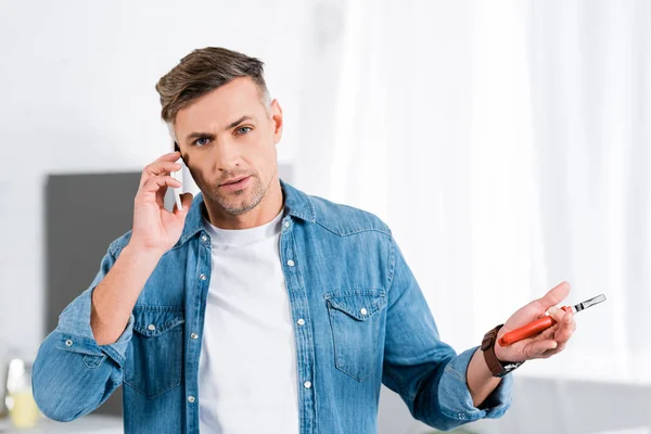 Handsome Man Talking Smartphone Holding Repair Tool — Stock Photo, Image