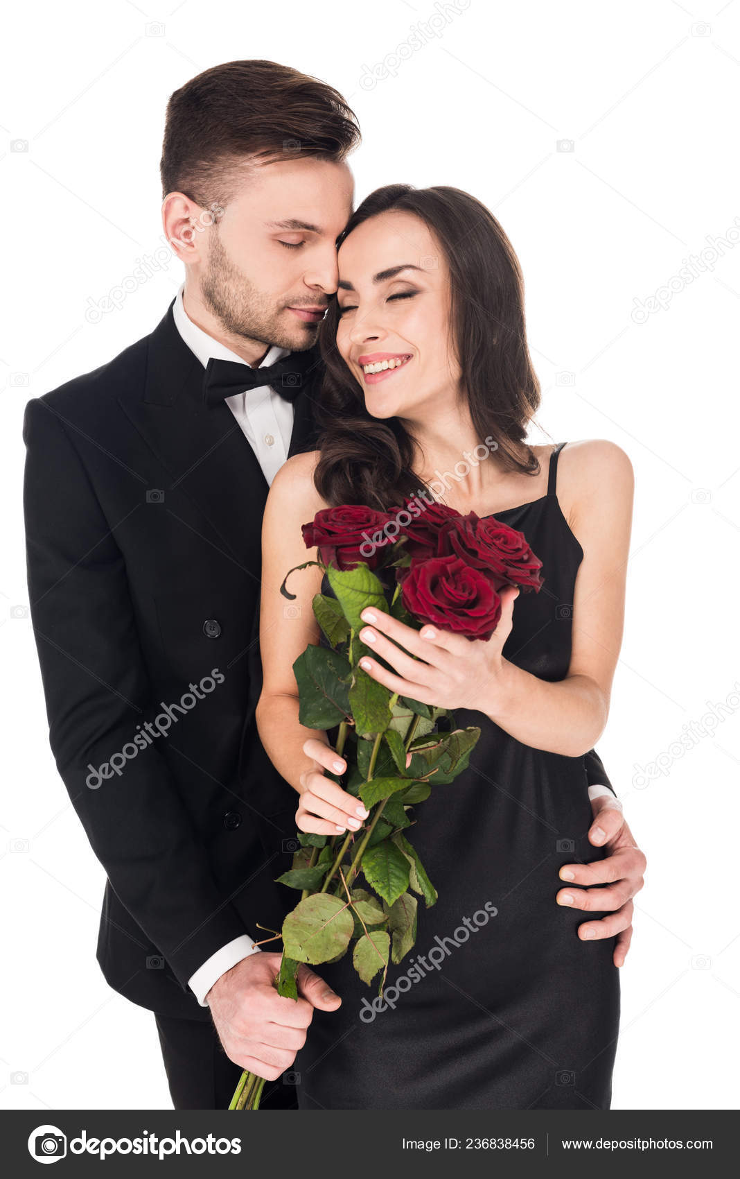 Image of Portrait of a Beautiful Young Woman Standing And Posing With A Red  Rose In Hand On an Isolated white Background-EG823852-Picxy