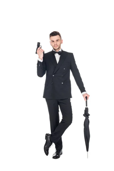 Przystojny Zabójca Smokingu Trzymając Pistolet Parasol Białym Tle — Zdjęcie stockowe