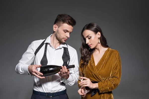 Handsome Boyfriend Pouring Champagne Girlfriend Isolated Grey — Stock Photo, Image