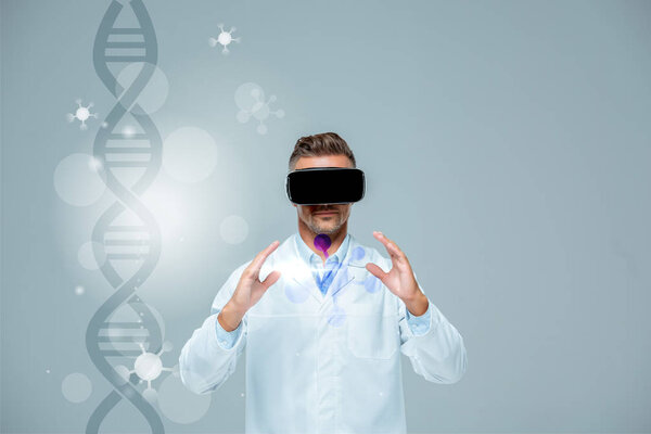 scientist in virtual reality headset holding something isolated on grey with dna, artificial intelligence concept