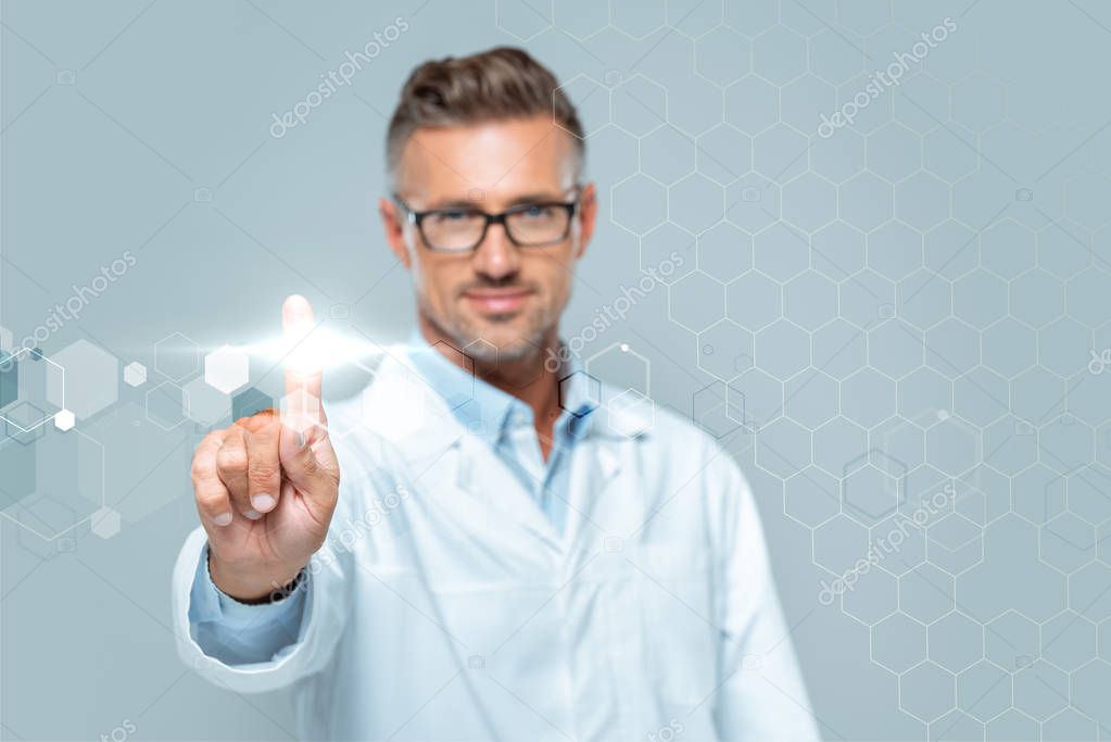 Selective focus of handsome scientist touching interface in air isolated on white, artificial intelligence concept