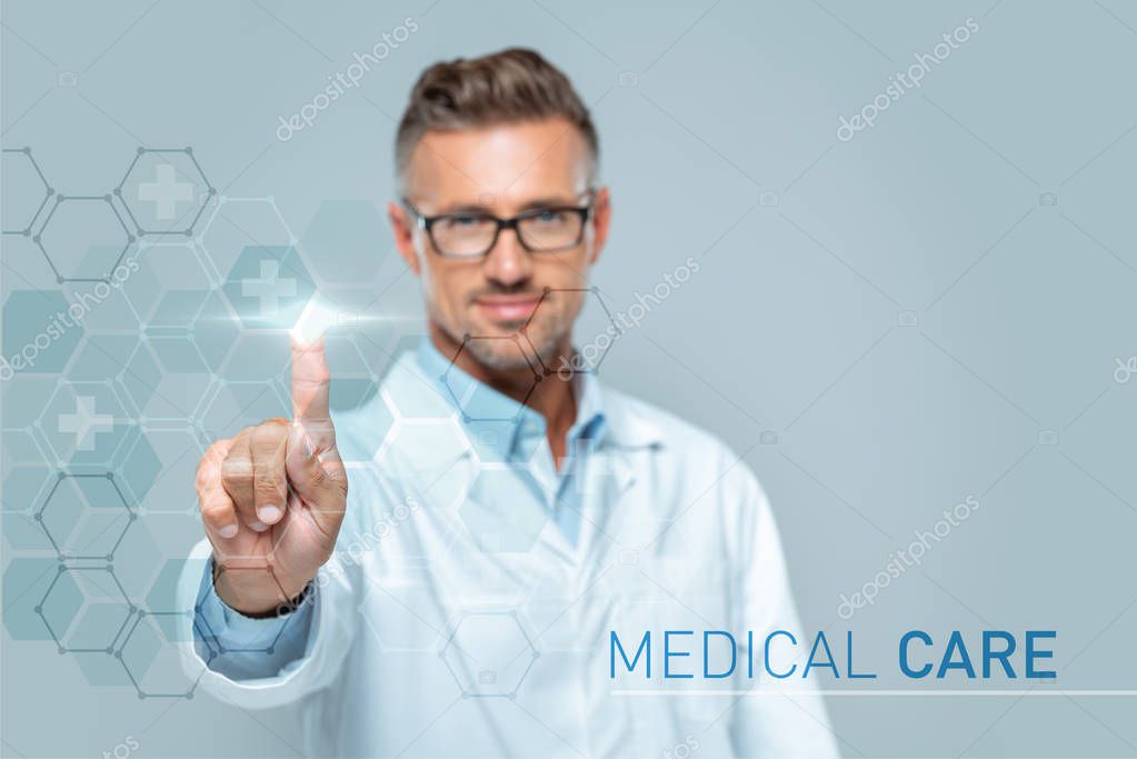 Selective focus of handsome scientist touching medical care interface in air isolated on white, artificial intelligence concept