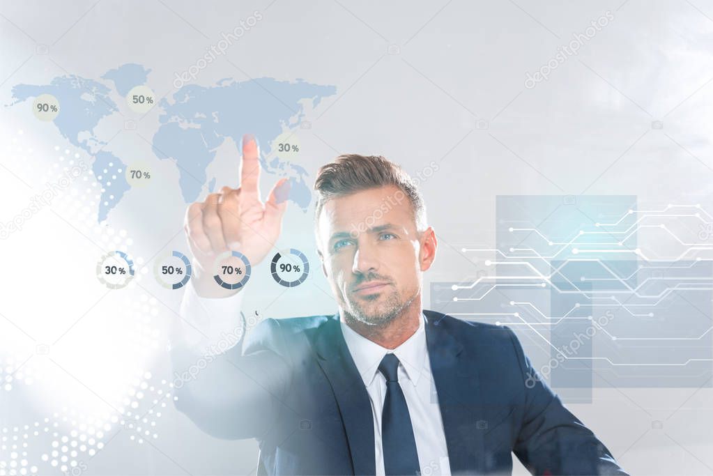 handsome businessman touching business icons with finger isolated on white, artificial intelligence concept
