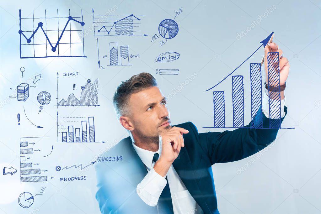 handsome businessman drawing graphs isolated on white, artificial intelligence concept