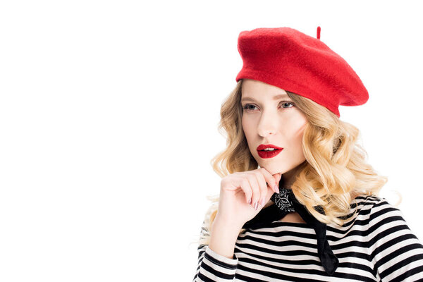 dreamy blonde woman in red beret isolated on white