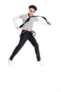 cheerful man in black beret smiling while jumping isolated on white  clipart