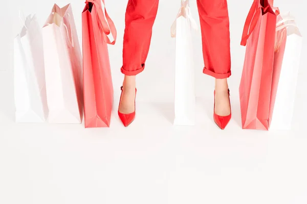 Cropped View Female Legs Red Shopping Bags Isolated White — Stock Photo, Image