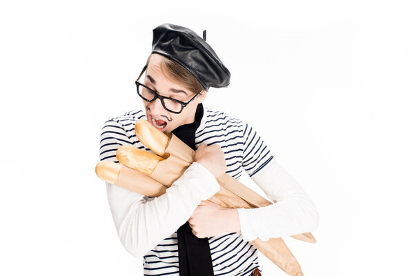 french man in glasses eating tasty baguettes isolated on white 
