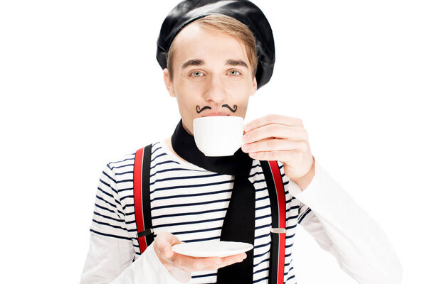 handsome parisian man drinking coffee isolated on white 
