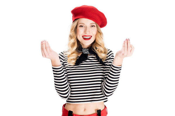 attractive woman in red beret smiling while gesturing isolated on white 