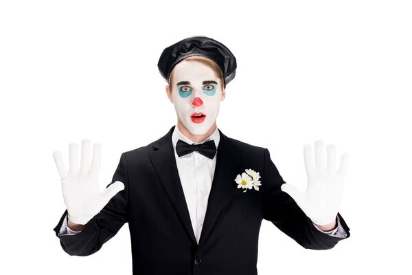 surprised clown in black beret and suit isolated on white 