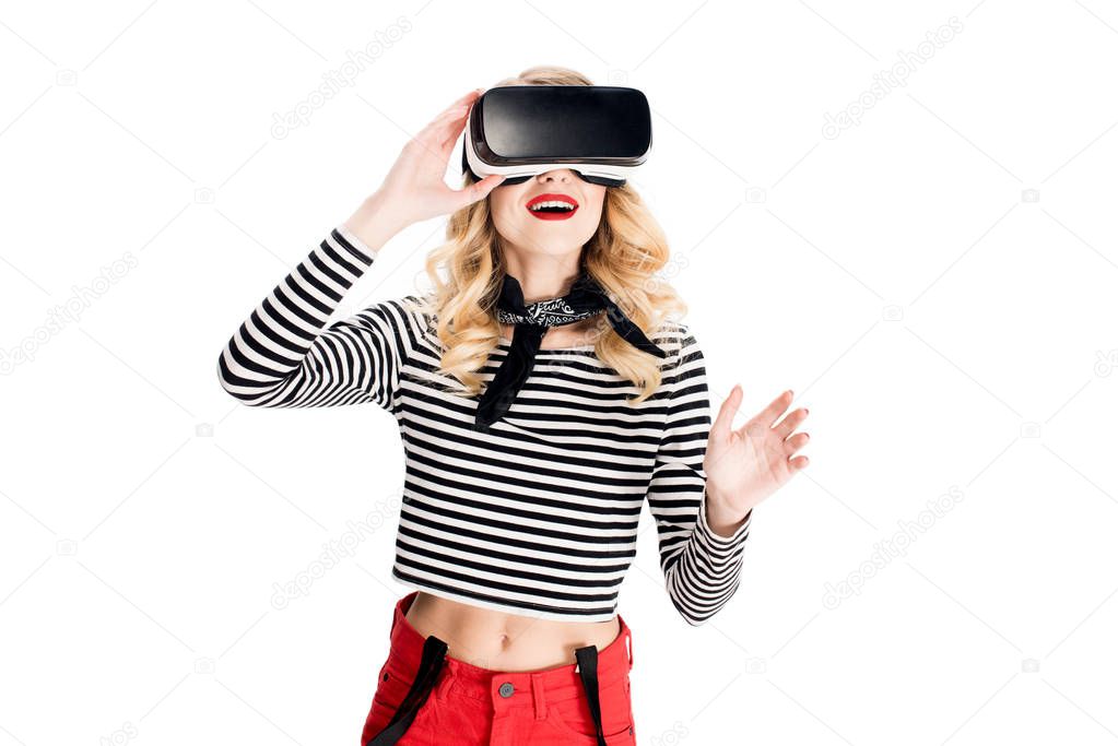 smiling woman using virtual reality headset isolated on white 