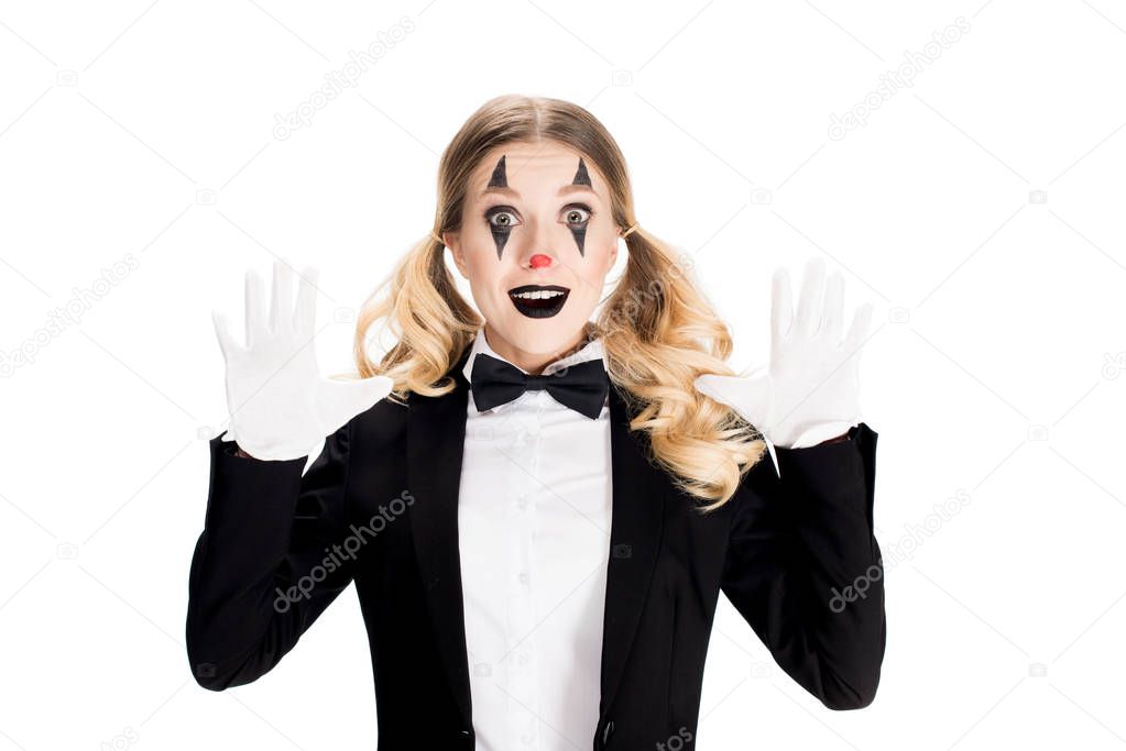 excited female clown showing white gloves isolated on white 