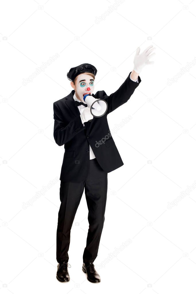angry clown in suit and black beret screaming in megaphone isolated on white 