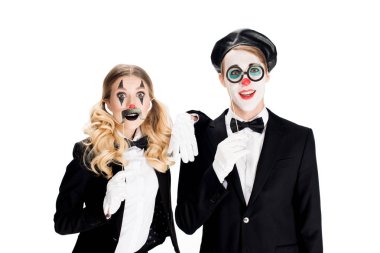 cheerful clowns with fake glasses and mustache on sticks isolated on white 