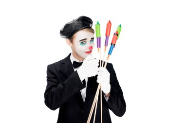 clown in suit and black beret holding firecrackers isolated on white  clipart