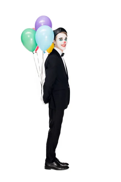 Cheerful Clown Suit Black Beret Holding Helium Balloons Back Isolated — Stock Photo, Image