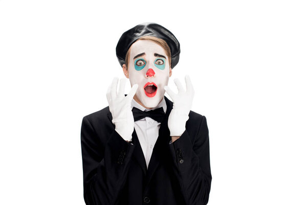frightened clown wearing white gloves suit abnd black beret isolated on white 