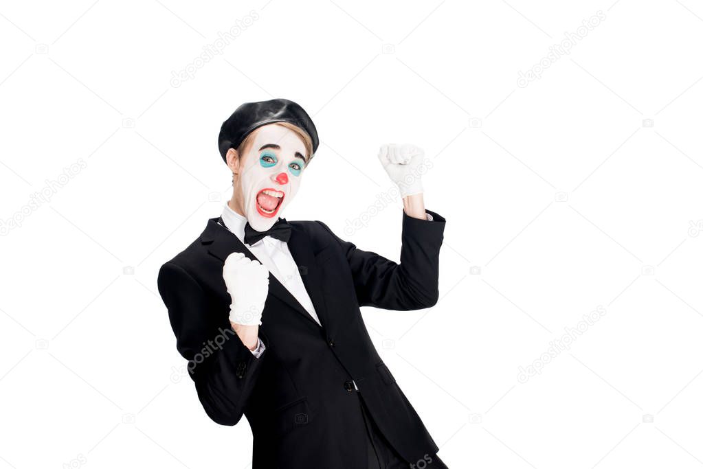 excited clown in suit celebrating winning isolated on white 