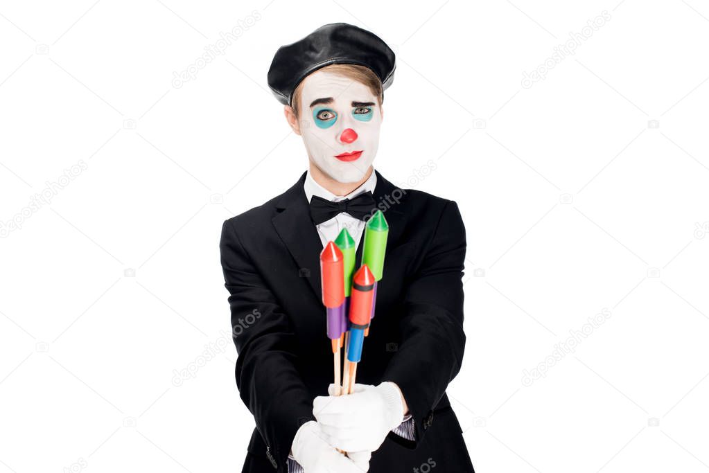 clown in suit holding firecrackers isolated on white 