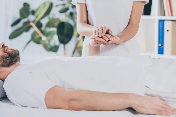 Cropped Shot Reiki Healer Holding Hand Calm Bearded Man — Stock Photo, Image