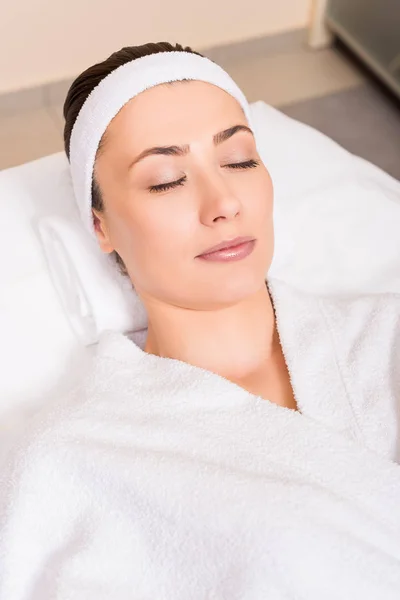 Woman Lying White Bathrobe Closed Eyes Beauty Salon — Stock Photo, Image