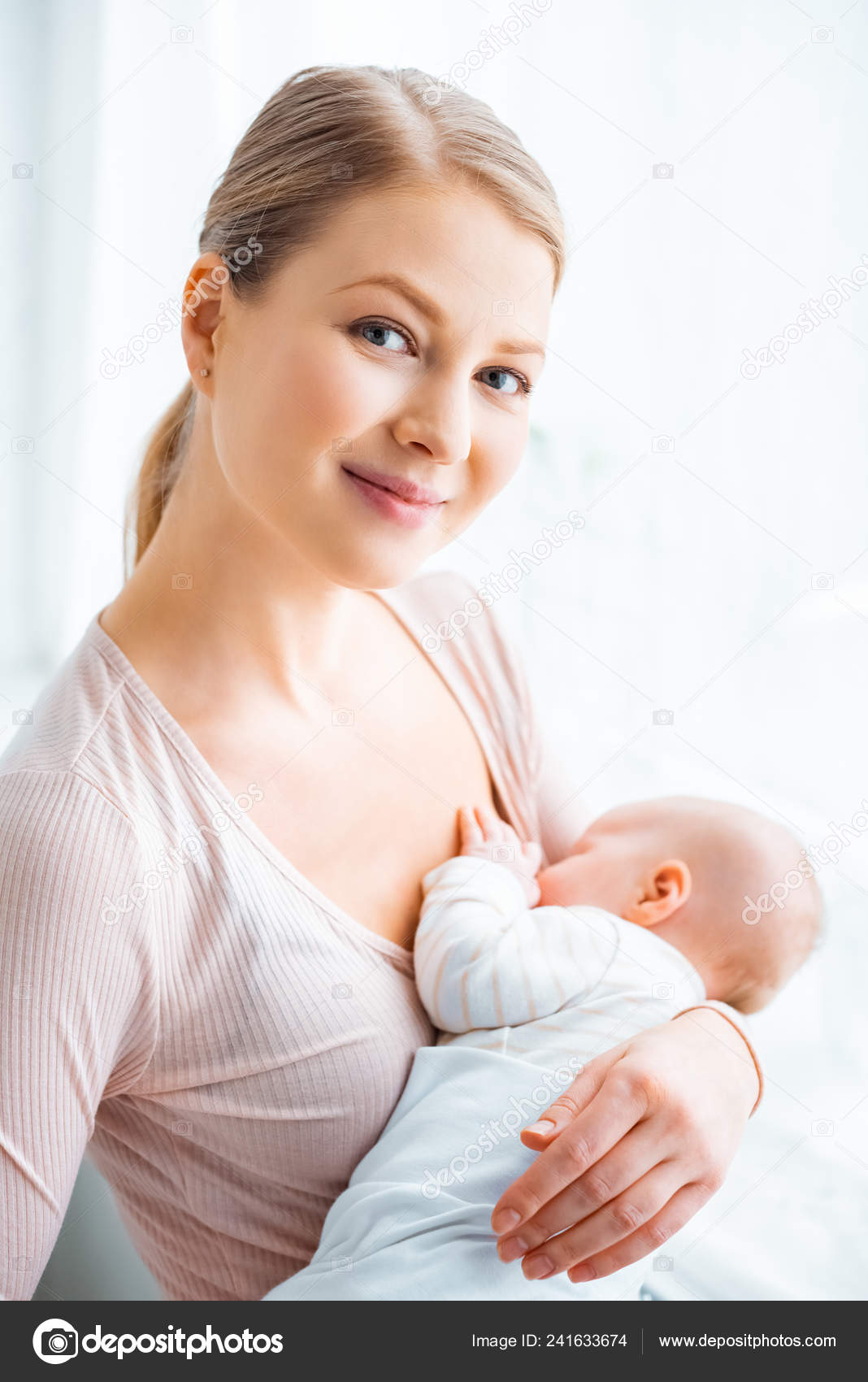 beautiful mother breastfeeding