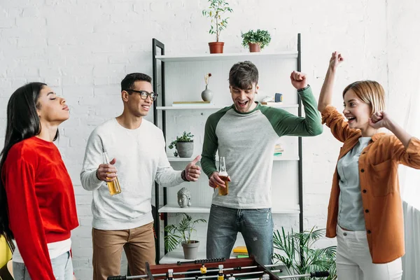 Multicultural Friends Standing Football Table Finishing Game — Stock Photo, Image