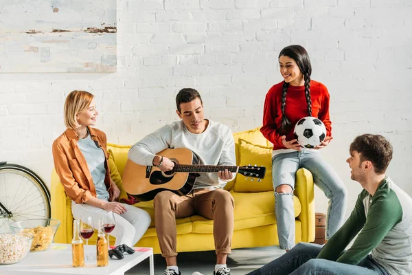 Young Mixed Race Man Playing Guitar Multicultural Friends Living Room — Stock Photo, Image
