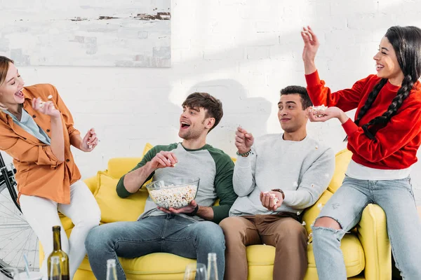 Multicultural Friends Fooling While Throwing Popcorn Each Other — Stock Photo, Image