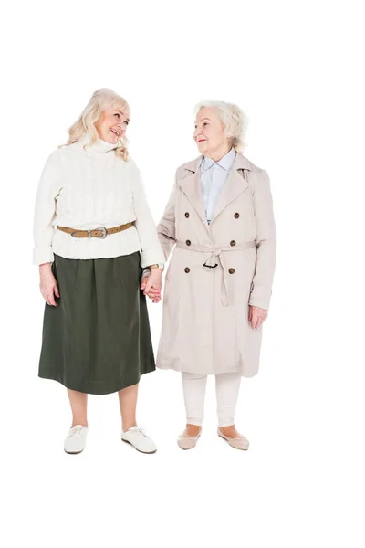 Happy Retired Women Holding Hands Isolated White — Stock Photo, Image