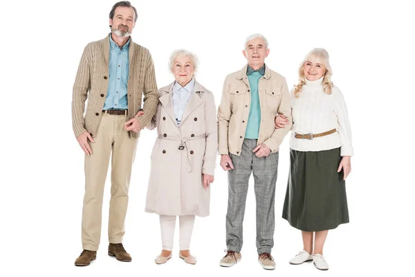 欢快的退休的人站在和微笑隔离在白色 — 图库照片
