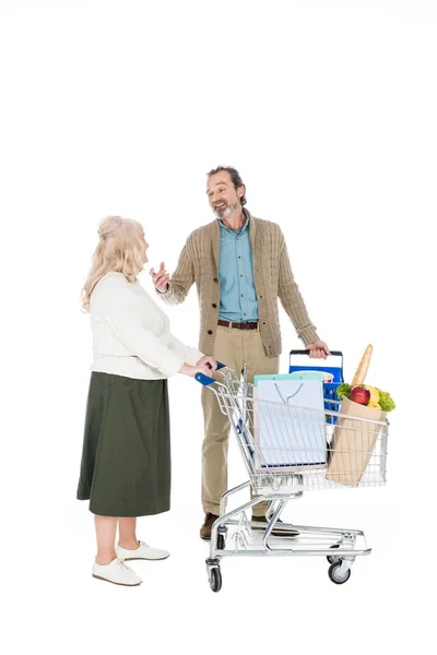 Retired Husband Talking Wife Holding Shopping Trolley Isolated White — Stock Photo, Image