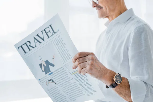 Cropped View Senior Man Reading Travel Newspaper Home — Stock Photo, Image