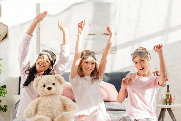 Beautiful Smiling Multicultural Girls Looking Camera Stretching Morning Pajama Party — Stock Photo, Image