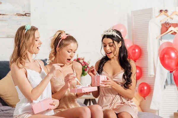 Beautiful Smiling Multicultural Girls Nightwear Opening Presents Pajama Party — Stock Photo, Image
