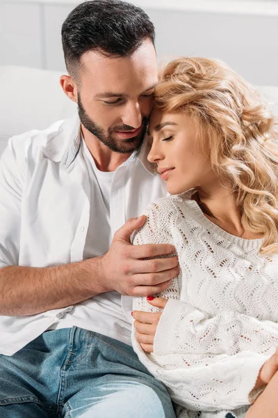 Brunette Young Man Gently Embracing Curly Girlfriend — Stock Photo, Image