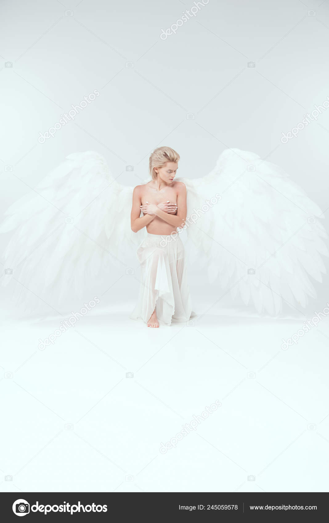 Premium Photo  A woman with a large breast and wings on her chest